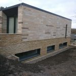 A contemporary house in a garden